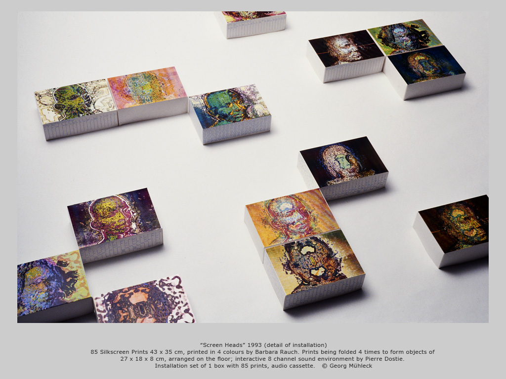 “Screen Heads” 1993 (detail of installation) 85 Silkscreen Prints 43 x 35 cm, printed in 4 colours by Barbara Rauch. Prints being folded 4 times to form objects of  27 x 18 x 8 cm, arranged on the floor; interactive 8 channel sound environment by Pier
