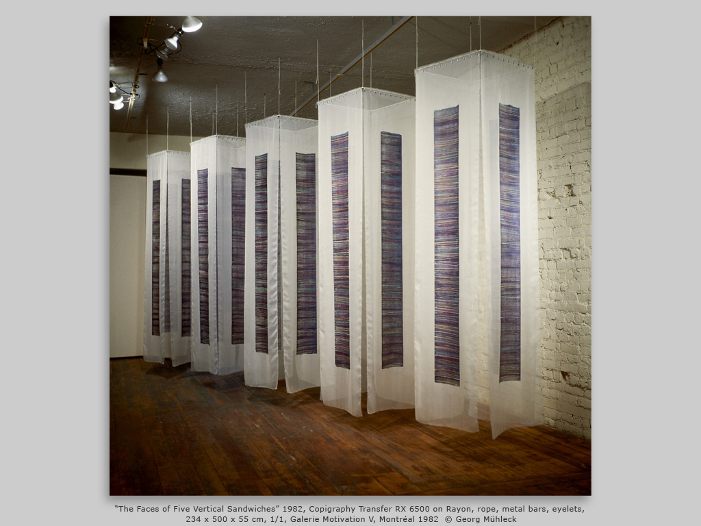 “The Faces of Five Vertical Sandwiches” 1982, Copigraphy Transfer RX 6500 on Rayon, rope, metal bars, eyelets, 234 x 500 x 55 cm, 1/1, Galerie Motivation V, Montréal 1982  © Georg Mühleck